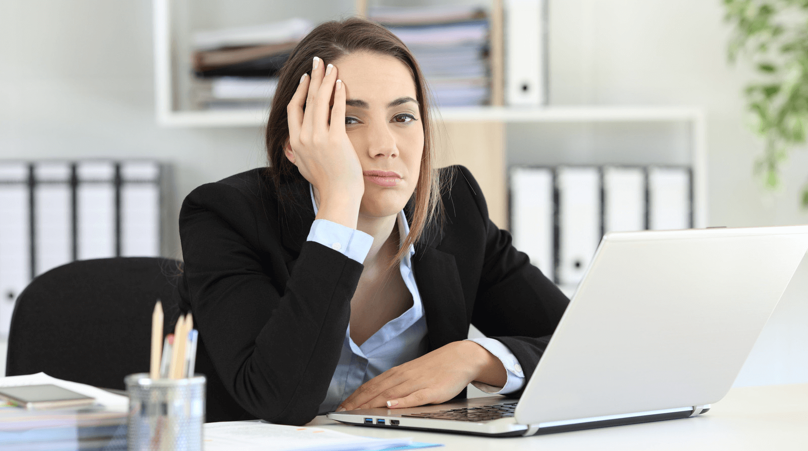 Bored worker at desk