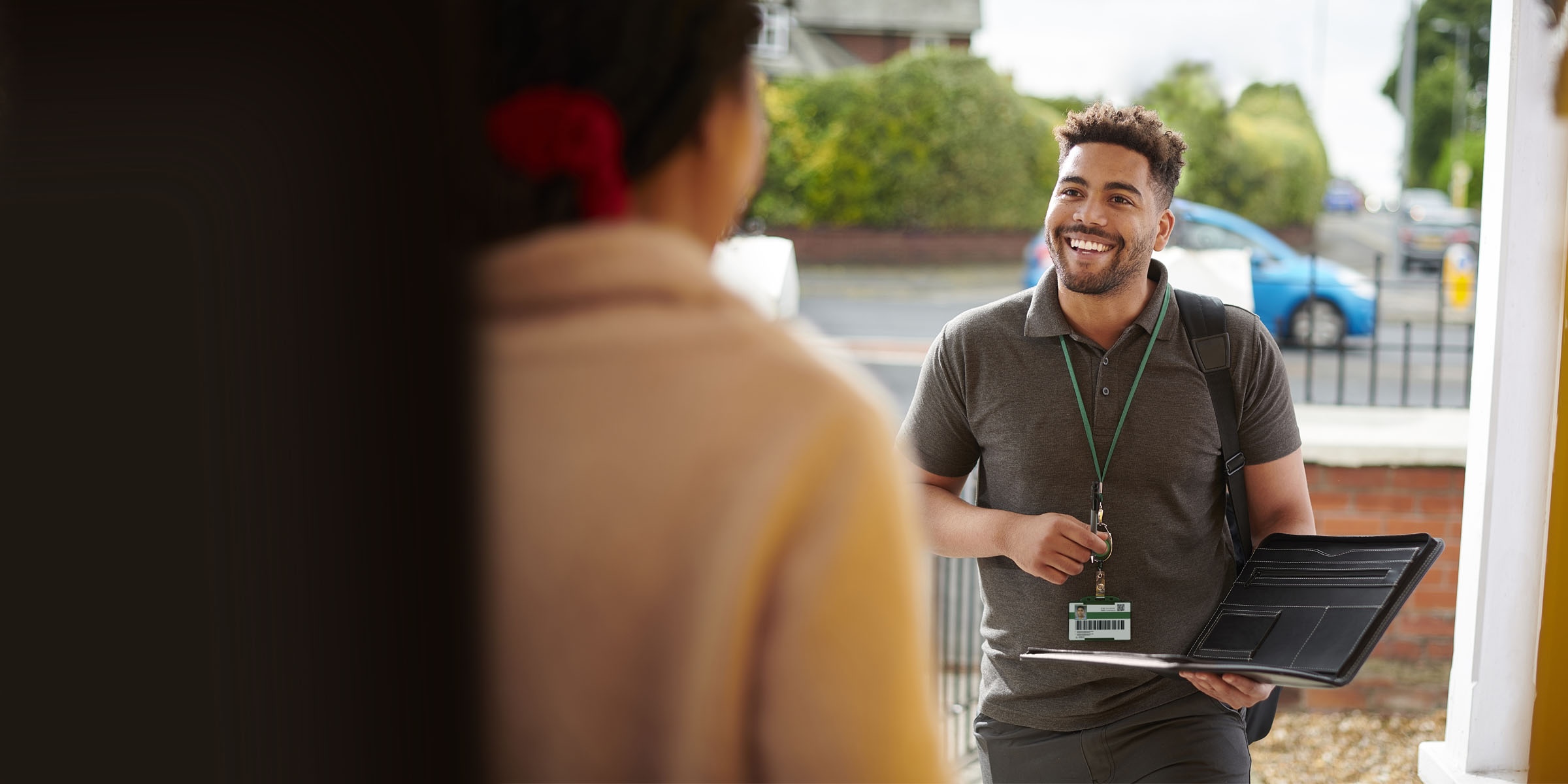 Energy sales person at front door